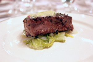 The fourth course, a porcini and rosemary crusted New York Strip