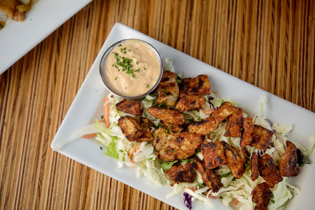 Choot’Em Alligator is served fried or blackened over salad with a choice of sweet chili or remoulade sauce.