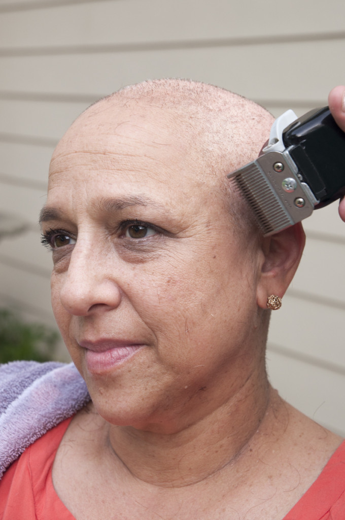 Ballard’s favorite photo of the series shows her mother sitting peacefully as her head is shaved.