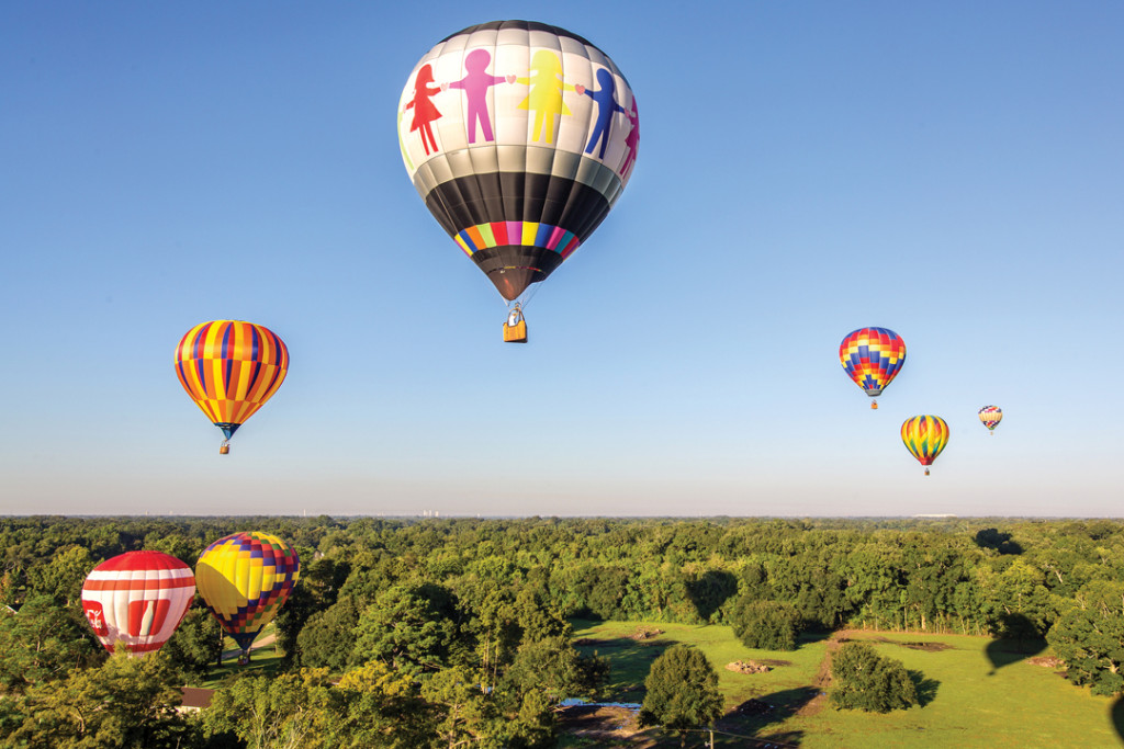 Hot air balloons over the Louisiana skyline. (Photo by Lawles Bourque)