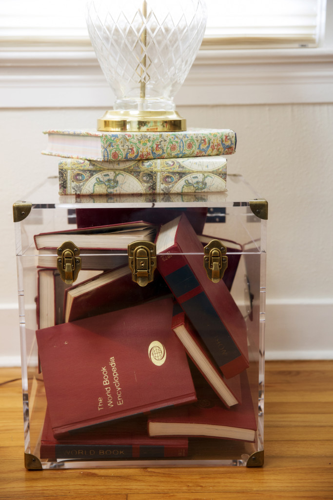 Andrus filled a lucite chest with her collection of vintage encyclopedias.