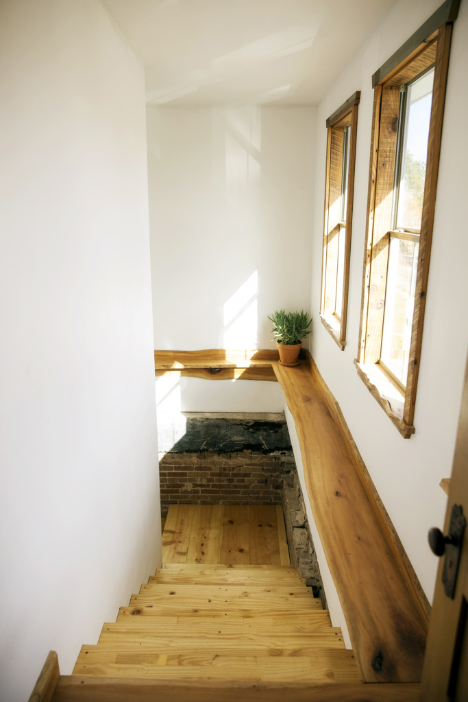 Even the stairs leading to the two-bedroom apartment were crafted by Moran. For this project, he used lumber from a neighbor’s fallen tree. 