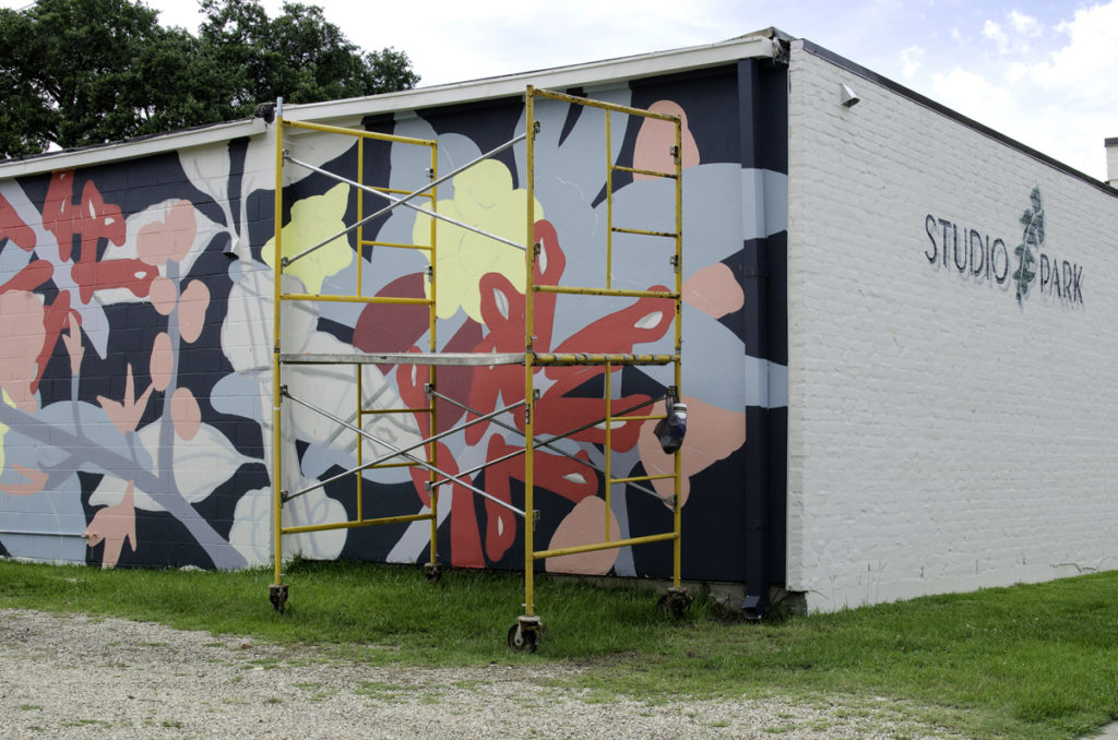 The work Diaz painted on the side of Studio Park, pictured while it was still in progress.