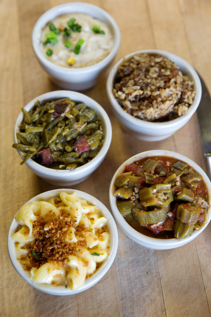 225 City Pork & Pie, Collin Richie Photo, 6.28.16 - The Cajun sandwich (ham, andouille and bacon) with kettle chips on the side - Pig Platter served with pickles, Texas toast and pickled red onions - Sides: Green beans, Cajun rice, smoked corn grits and stewed okra. - Dessert: Lemon and Strawberry Pie
