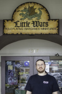 Owner Andrew Inzenga keeps hobbyists stocked with miniatures, guides and all the trappings of their favorite games. Photo by Miriam Buckner.