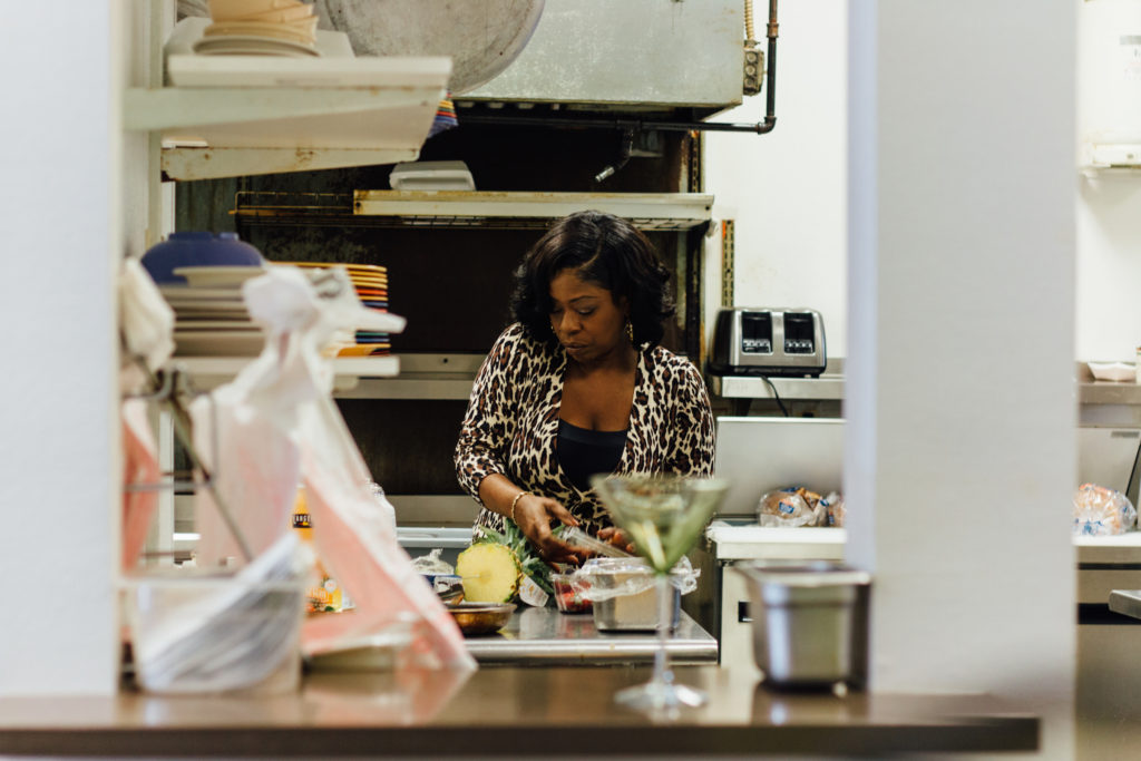 Owner Stephanie Phares works in the kitchen to get brunch cocktails ready.