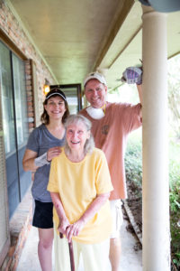 Eulalia Bonneville with Sue and David Day—strangers who housed her after the flood and have helped to restore her flooded home. Photo by Collin Richie.
