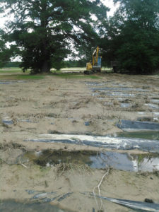 Much of the good soil in the Fletcher family’s fields washed away in the flooding. Photo provided by BREADA.