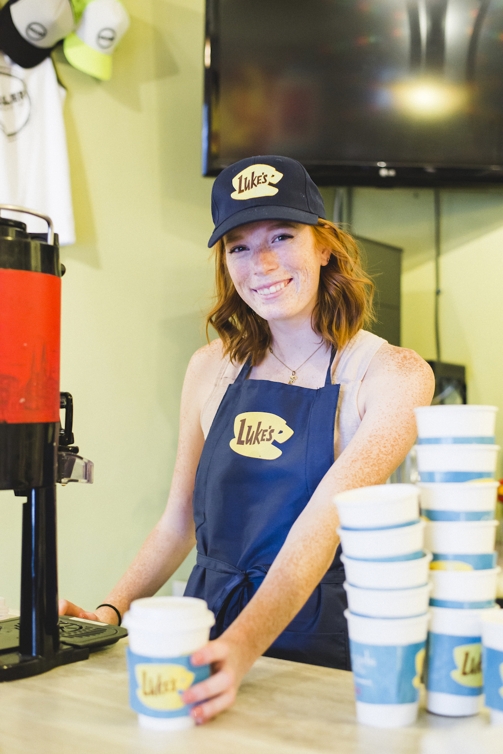 Faith Denham serves up Luke's coffee at Brew Ha-Ha!
