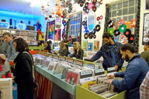 Patrons flood into Atomic Pop Shop during White Light Night. Photo by Allie Appel.