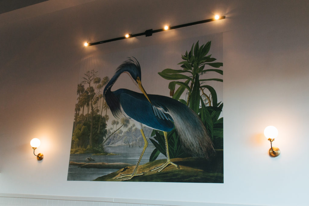 An 8-foot-wide mural of a Louisiana Blue Heron adorns one wall in the restaurant.