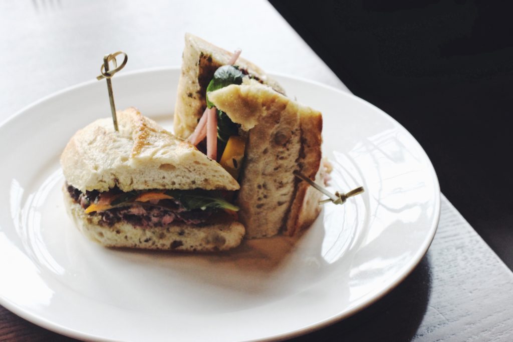 Cocha's panini with tender strips of steak and a chimichurri sauce.