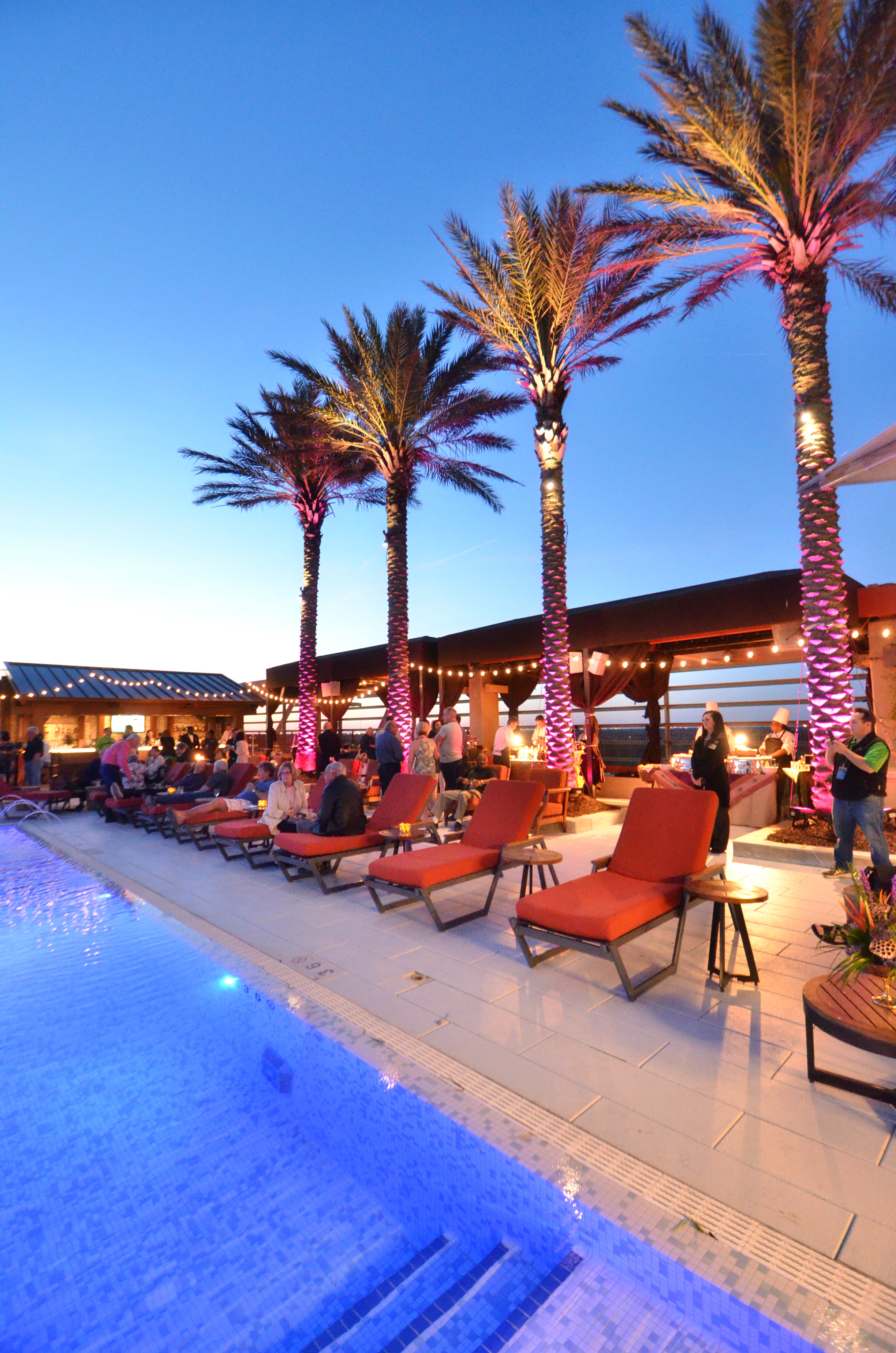 Party on the rooftop at L’Auberge’s summer poolside series