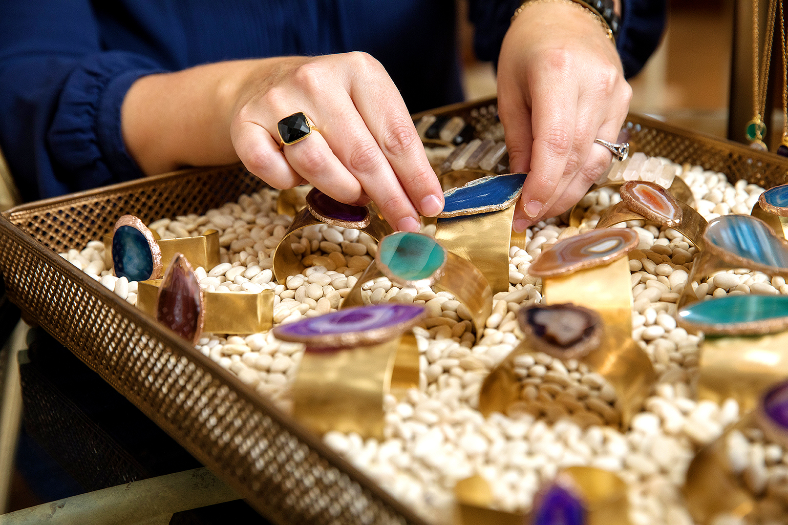 A local jewelry maker uses crystals and stones to create unique pieces 