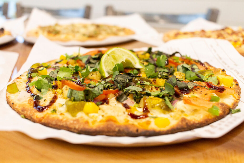 Inside the new Pizza Artista, defined by Cajun influences and a topping