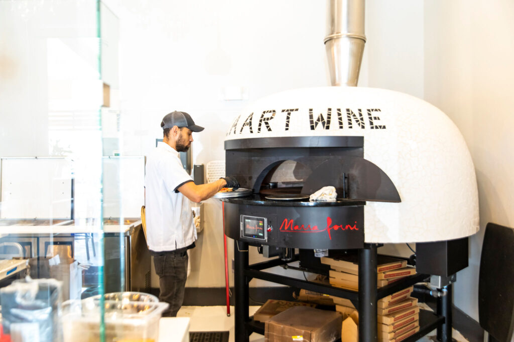 Peek inside the new Pizza Art Wine, combining art, highend flavors and